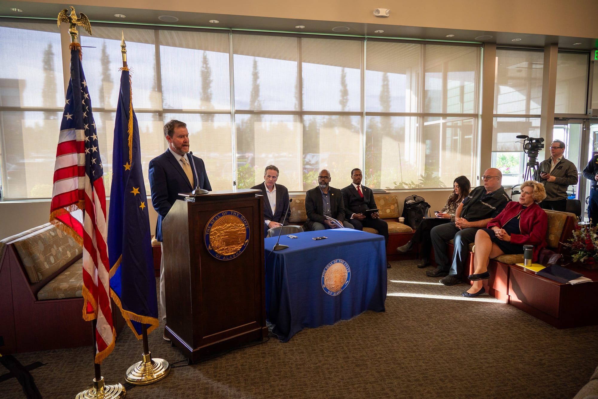 Dr. Wade Erickson speaks during a bill signing at a Capstone clinic in Wasilla