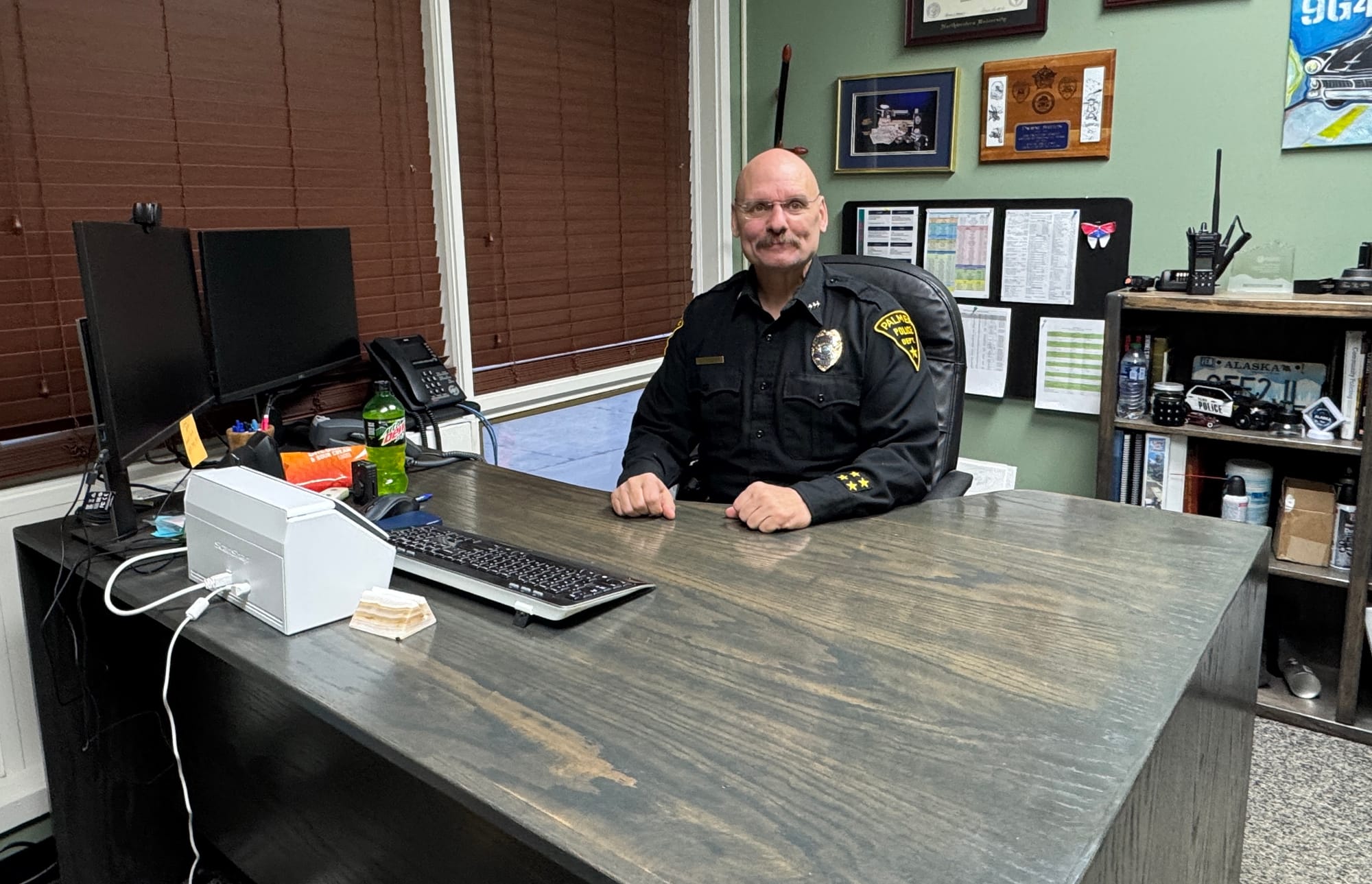 Palmer Police Chief Dwayne Shelton sits in his office