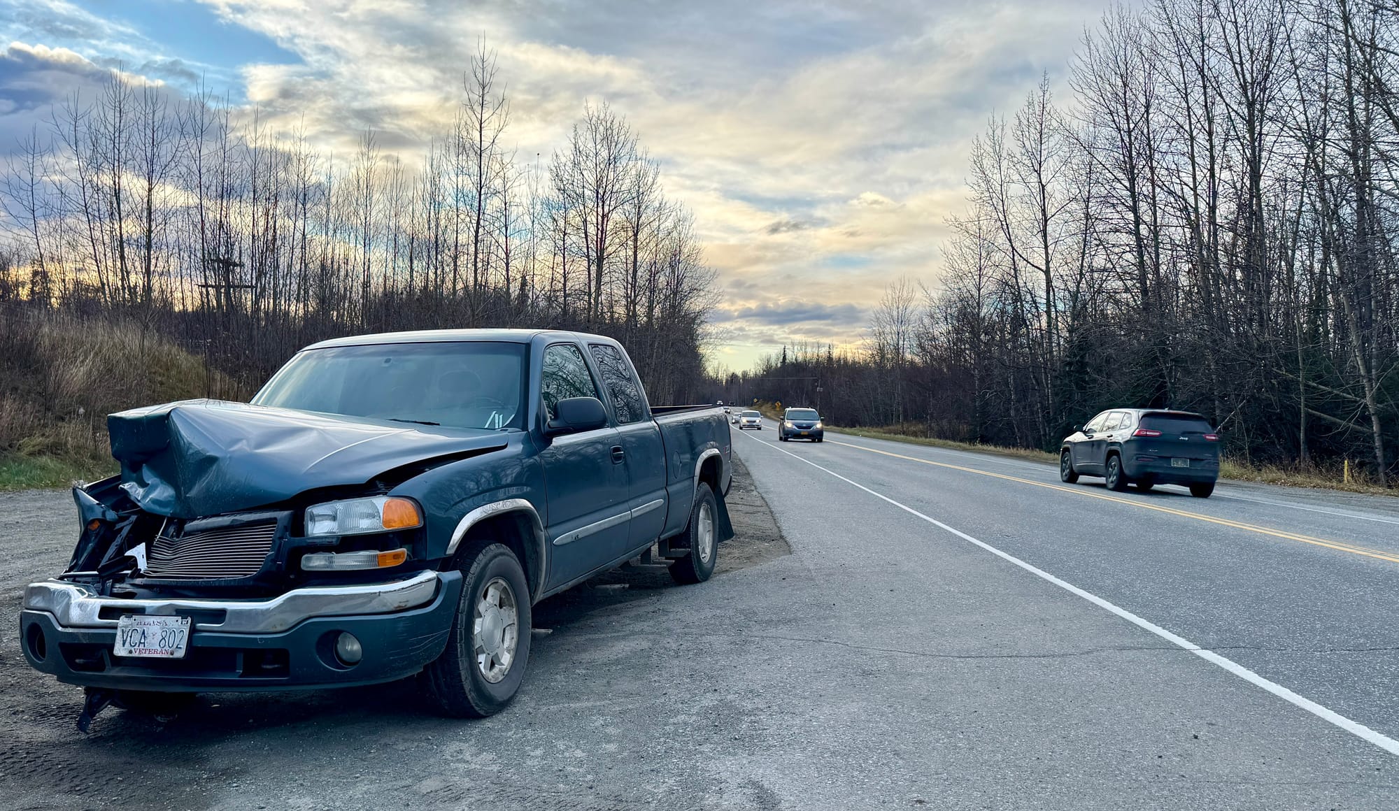 A vehicle sits on the side of Bogard Road after an accident