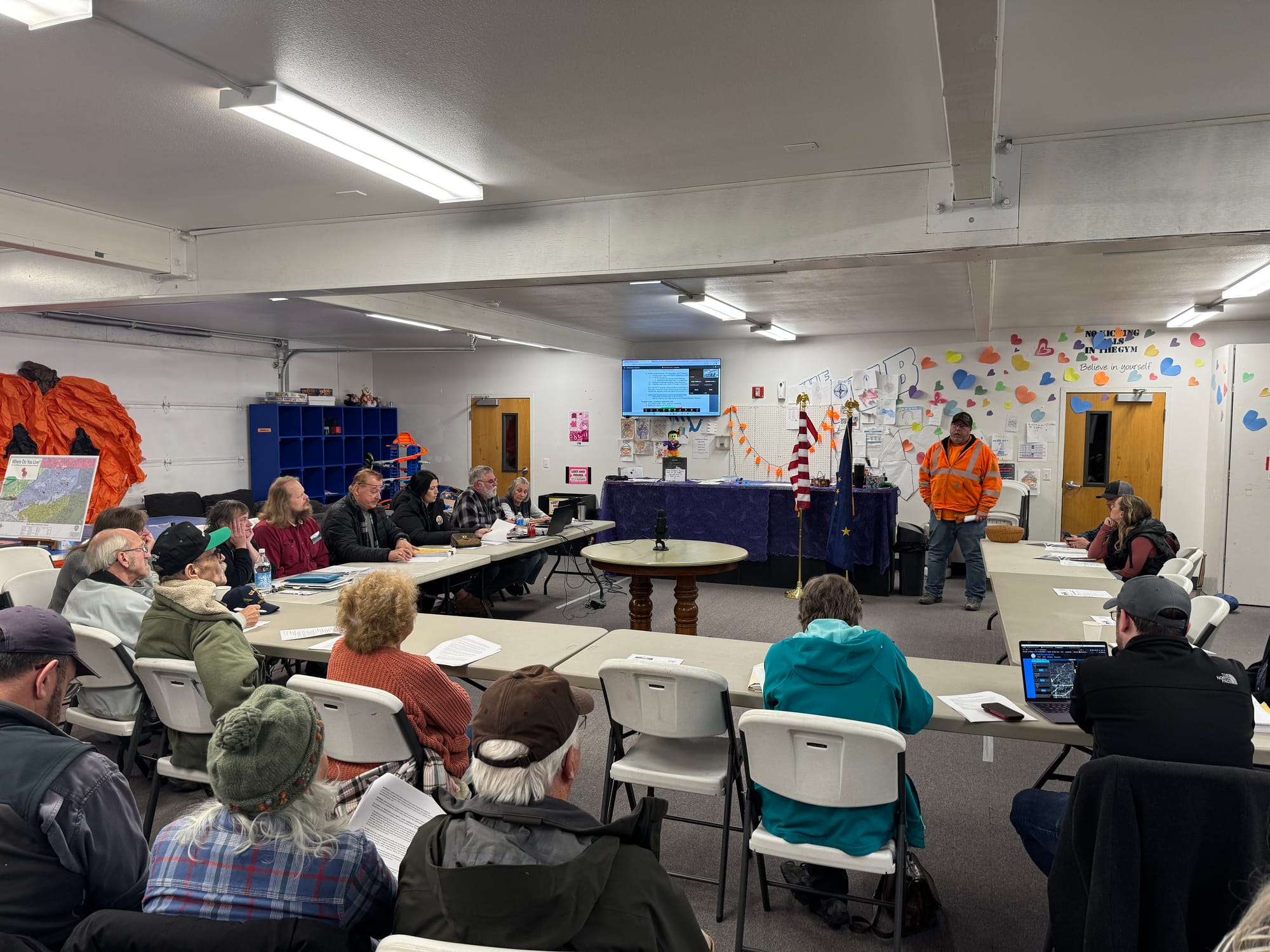 Central Gravel Products co-owner Jade Laughlin speaks before the North Lakes Community Council