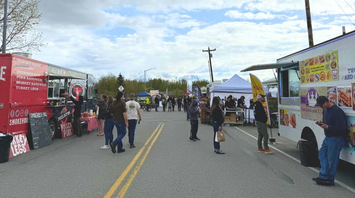 Shoppers visit food vendors at the weekly Friday Fling in Palmer, Alaska.