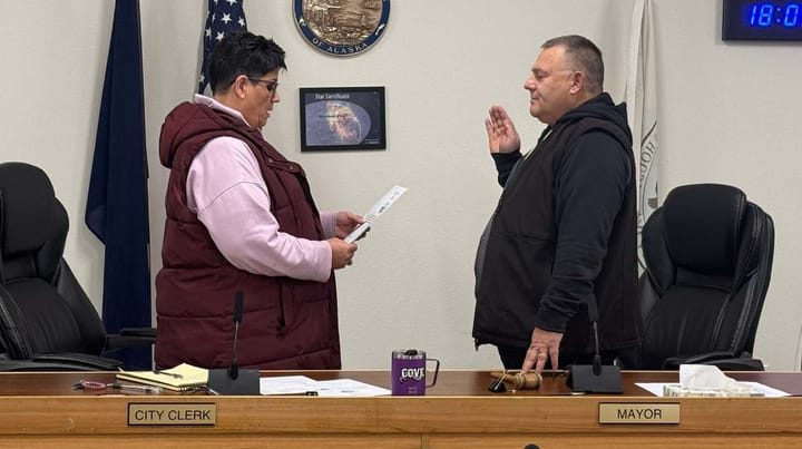 Houston City Clerk Tani Weiber Schoneman swears in newly reelected Mayor and Council member Carter Cole