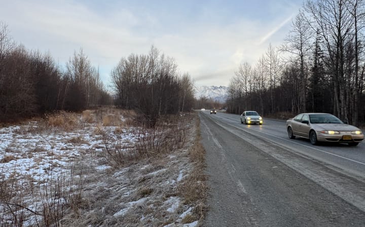 Vehicles travel along Bogard Road