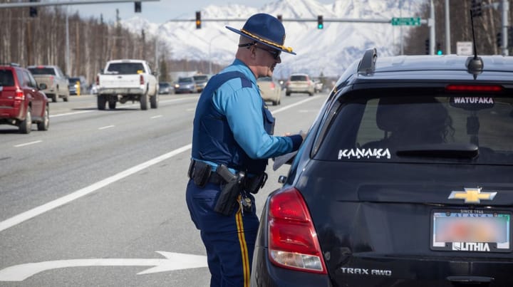 An Alaska State Trooper conducts a traffic stop.