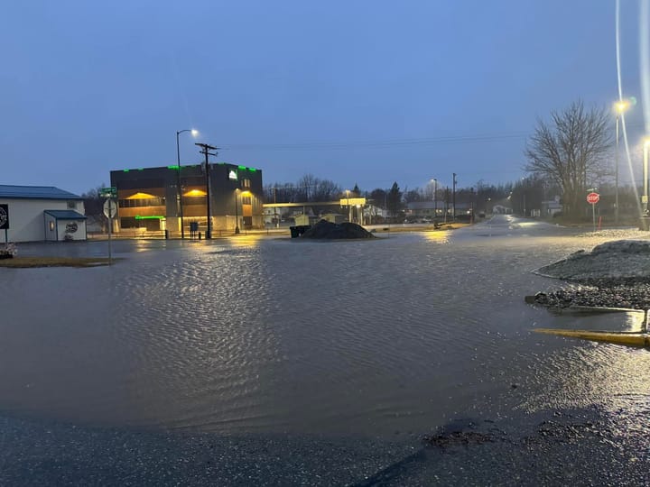 Flooding blocks the road at the intersection of Colony Way and Fireweed Road in Palmer 