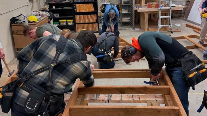 Students learn construction methods at a free jobs skill program